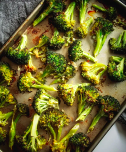 Lemon and garlic roasted broccoli on pan