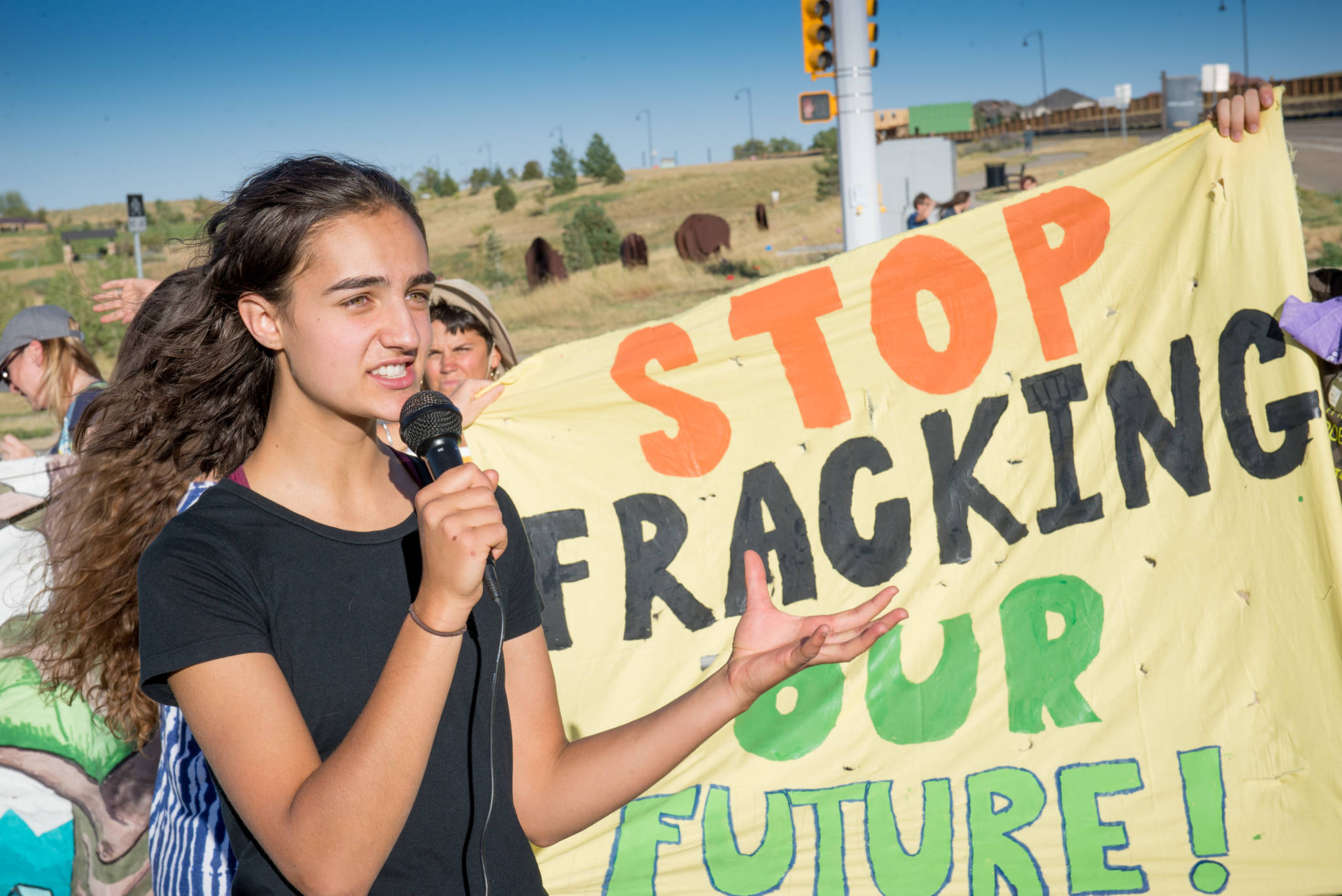 girl protests fracking