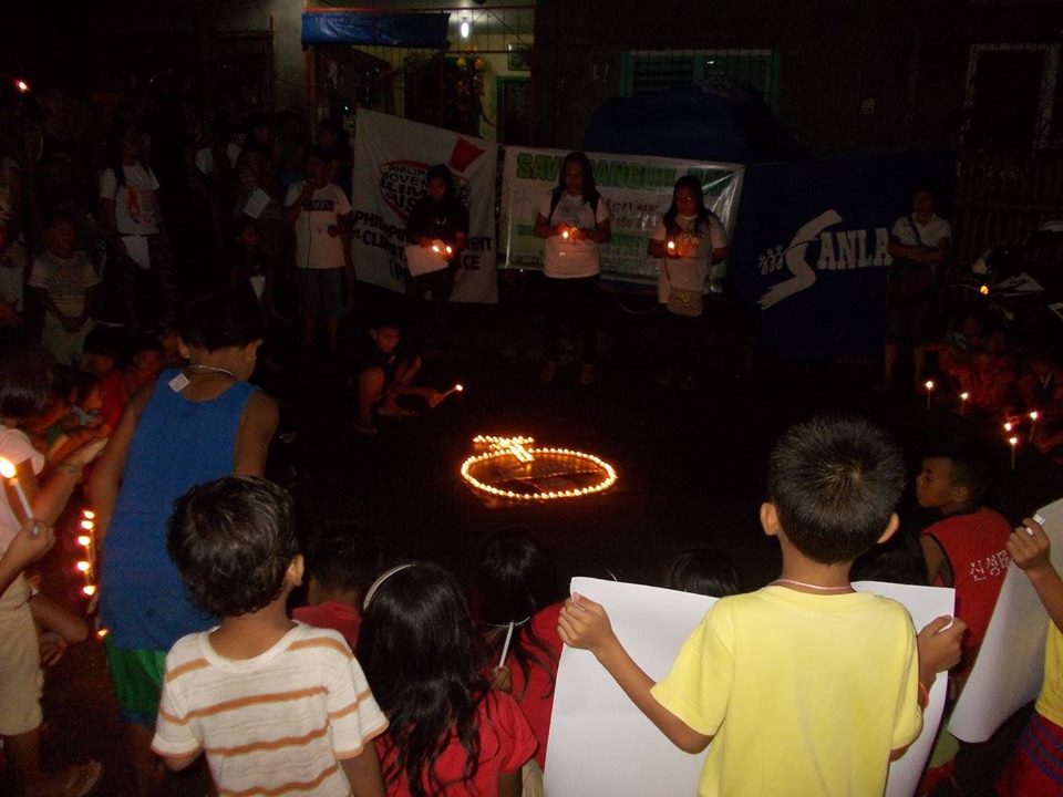 Western Mindanao: Anti-coal communities in West Mindanao hold a candle-light vigil for Reclaim Power.