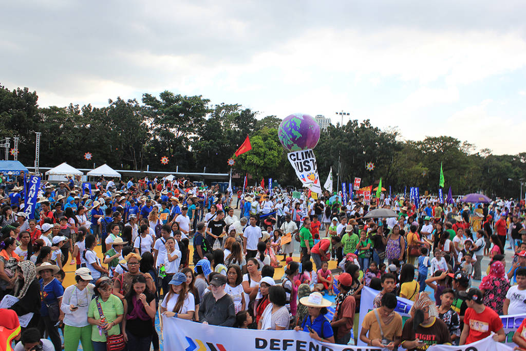 More than 15,000 Filipinos took the streets on the eve of the global climate talks in Paris last year to demand drastic climate action. Photo: AC Dimatatac