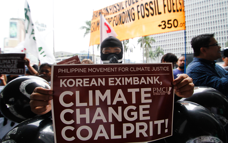Filipino climate justice activists protested today, October 11, 2016, in front of the local headquarters of the Export­Import Bank of Korea (KEXIM), in Makati City, demanding that it stop funding fossil fuel projects worldwide and be banned from receiving climate funding. The activists are part of 350.org, a global climate movement which co­signed a civil society letter demanding that the GCF board exclude export credit agencies such as KEXIM from accreditation. The demonstration was also part of Reclaim Power, a global month of action aimed at institutions funding dirty energy projects that fuel climate change.