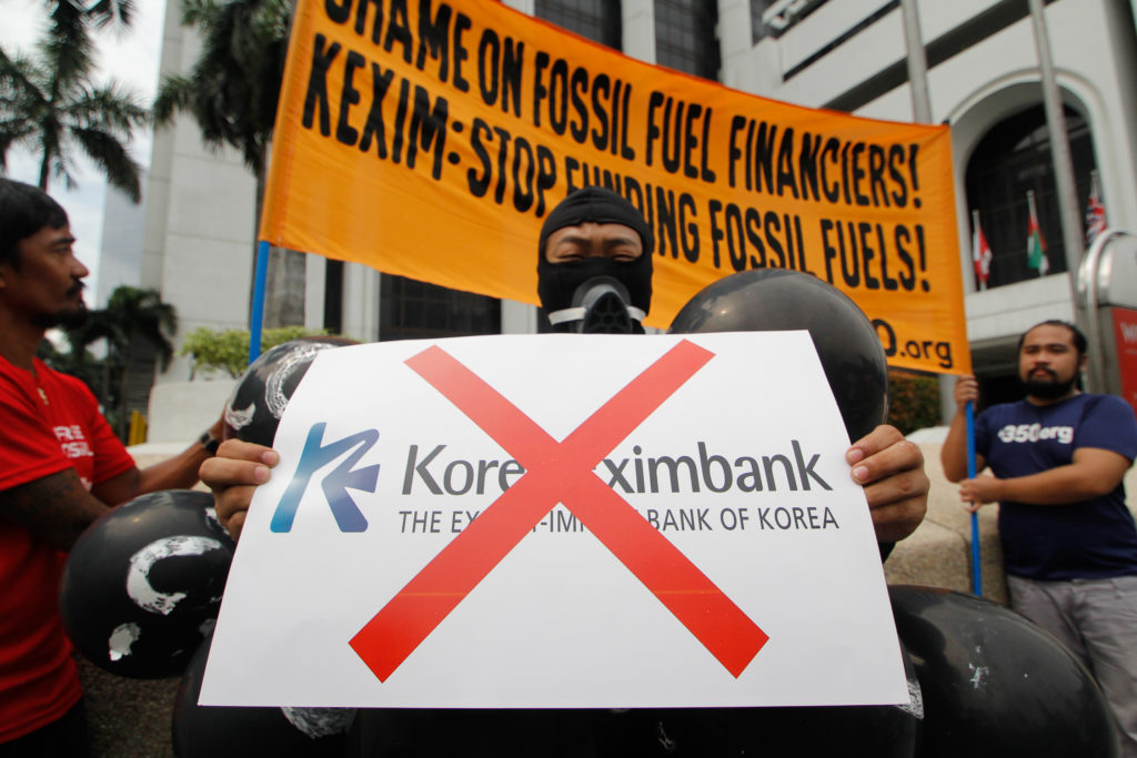 Filipino climate justice activists held a at the headquarters of the Export-Import Bank of Korea (KEXIM) office in Manila, demanding that it stop funding fossil fuel projects worldwide and be banned from receiving climate funding. Photo: AC Dimatatac