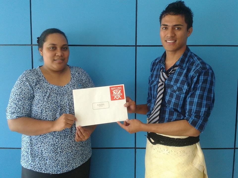 Tongan Climate Warrior, Taufu'i Naufahu, delivers the letter to ANZ management in Tonga.