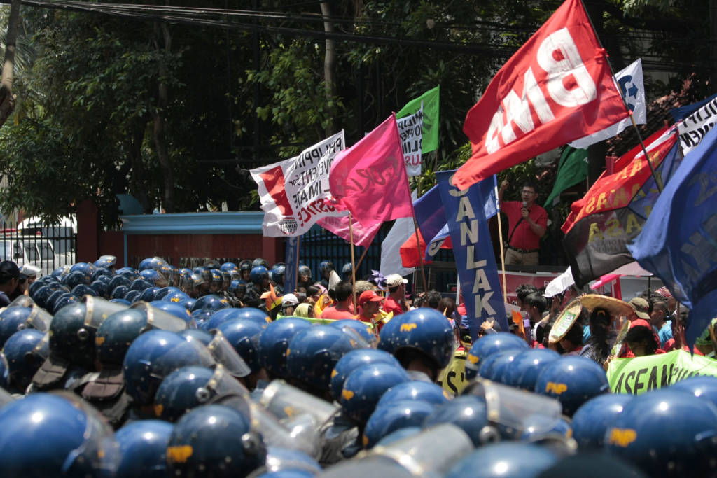 Activists are met by a throng of policemen as they try to march towards the venue of the Association aof Southeast Asian Nations (ASEAN) meetings in Manila on April 28, 2017 to demand their leaders to end all coal projects and commit to renewable energy. Southeast Asia remains a global coal hotspot despite drastic reductions in renewable energy costs and the region's vulnerability to climate change. (Photo: RB Ibañez/350.org)